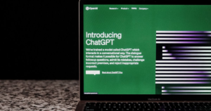 AI brand voice Introducing ChatGPT on laptop screen
