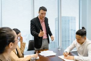 Business meeting with team discussing strategy